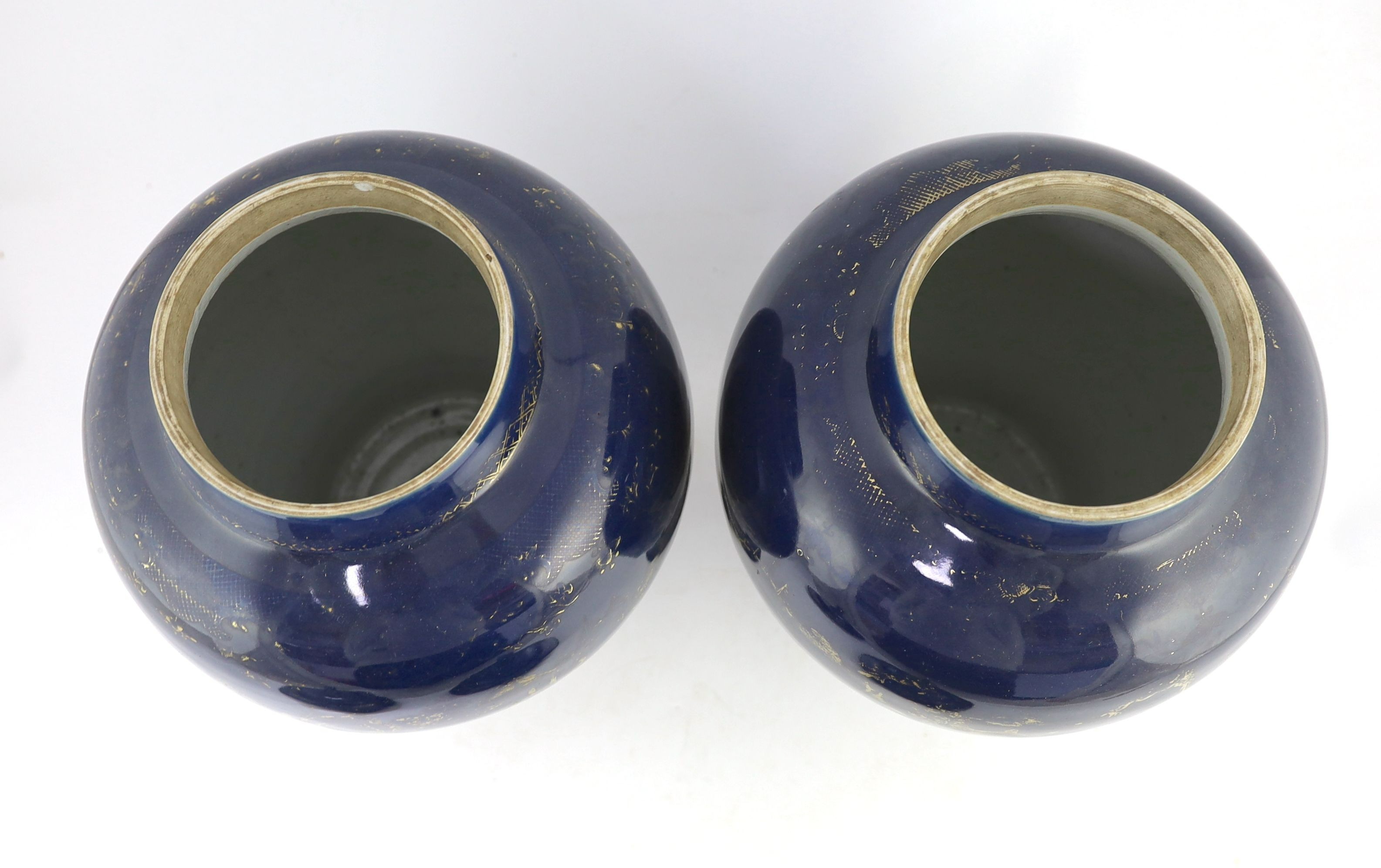 A pair of Chinese gilt-decorated blue ground baluster vases and covers, 19th century, 44 cm high